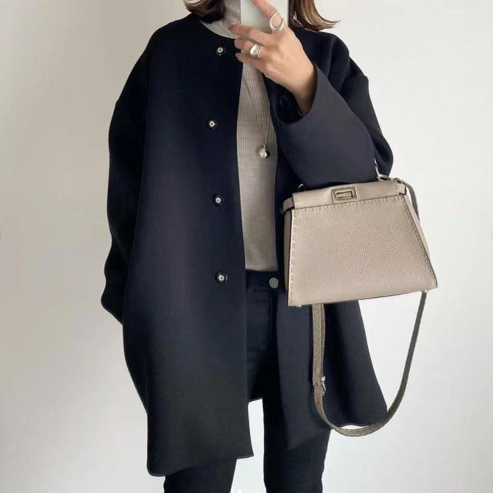 Damer Elegant Oversized Ullkappa med Dubbla Knappstängningar och Sidofickor Mirla-Eva Jonsson