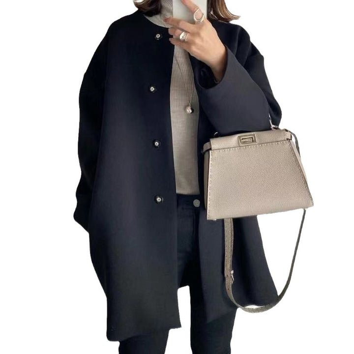 Damer Elegant Oversized Ullkappa med Dubbla Knappstängningar och Sidofickor Mirla-Eva Jonsson