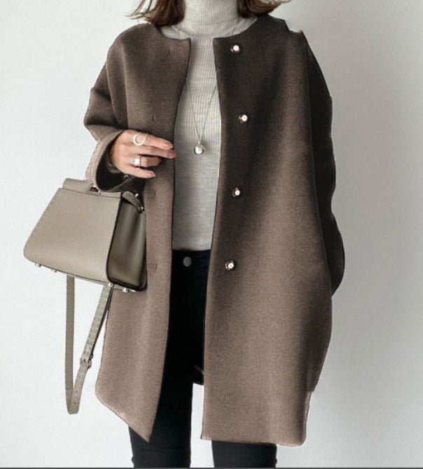 Damer Elegant Oversized Ullkappa med Dubbla Knappstängningar och Sidofickor Mirla-Eva Jonsson