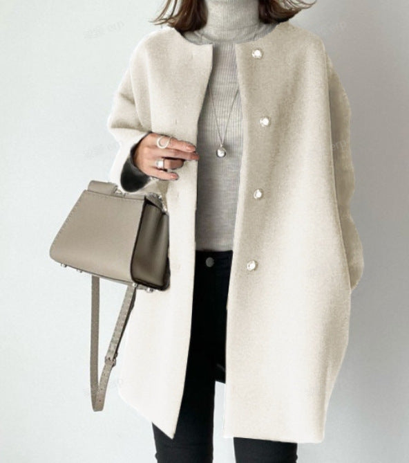 Damer Elegant Oversized Ullkappa med Dubbla Knappstängningar och Sidofickor Mirla-Eva Jonsson