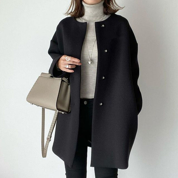 Damer Elegant Oversized Ullkappa med Dubbla Knappstängningar och Sidofickor Mirla-Eva Jonsson