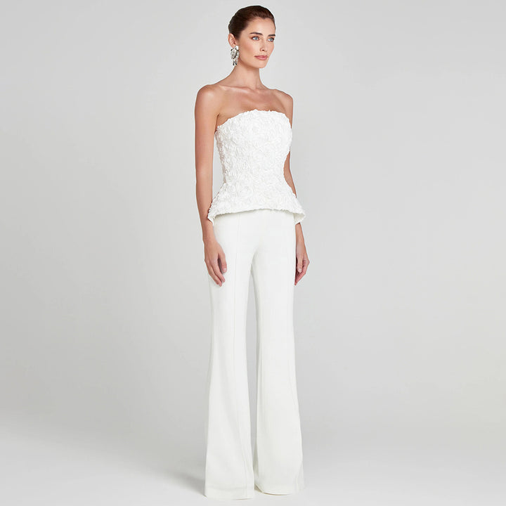 Damer Elegant Peplum-topp med utsvängda byxor Mirla-Eva Jonsson