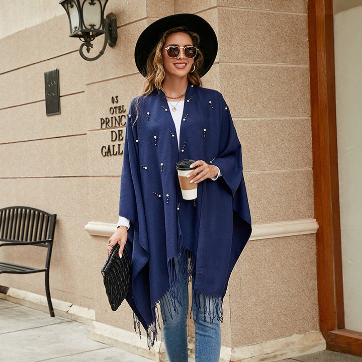 Damer Elegant Poncho med Blommigt Broderimönster och Fransiga Kants Mirla-Eva Jonsson