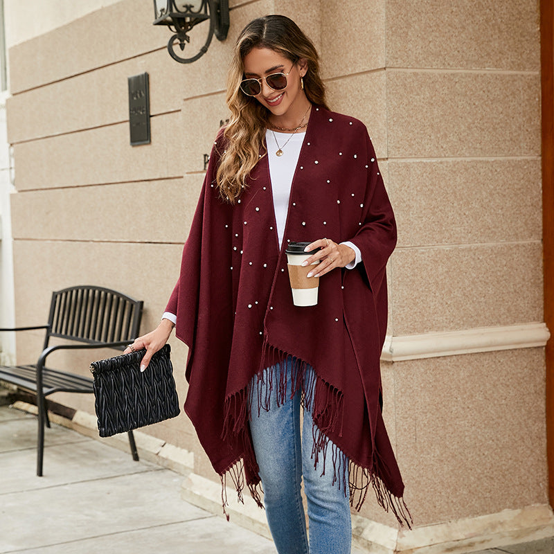 Damer Elegant Poncho med Blommigt Broderimönster och Fransiga Kants Mirla-Eva Jonsson