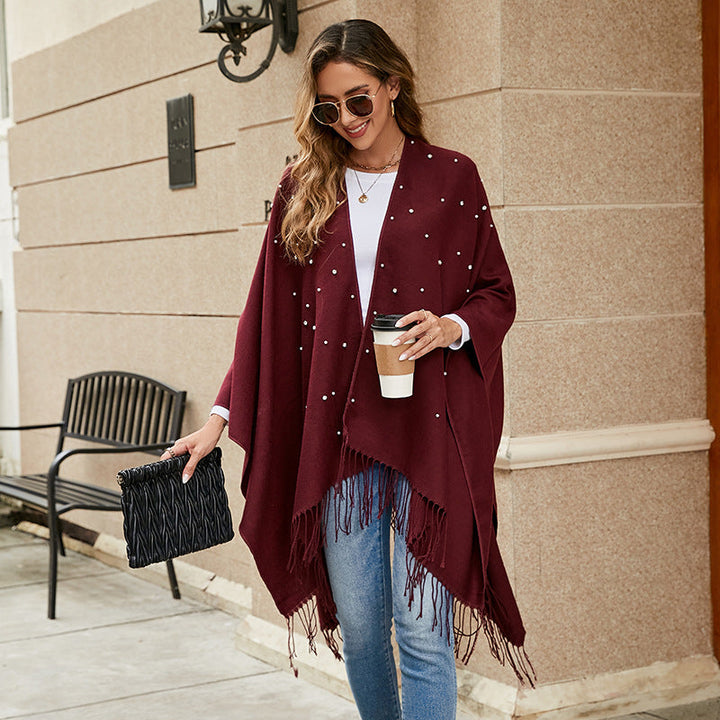 Damer Elegant Poncho med Blommigt Broderimönster och Fransiga Kants Mirla-Eva Jonsson