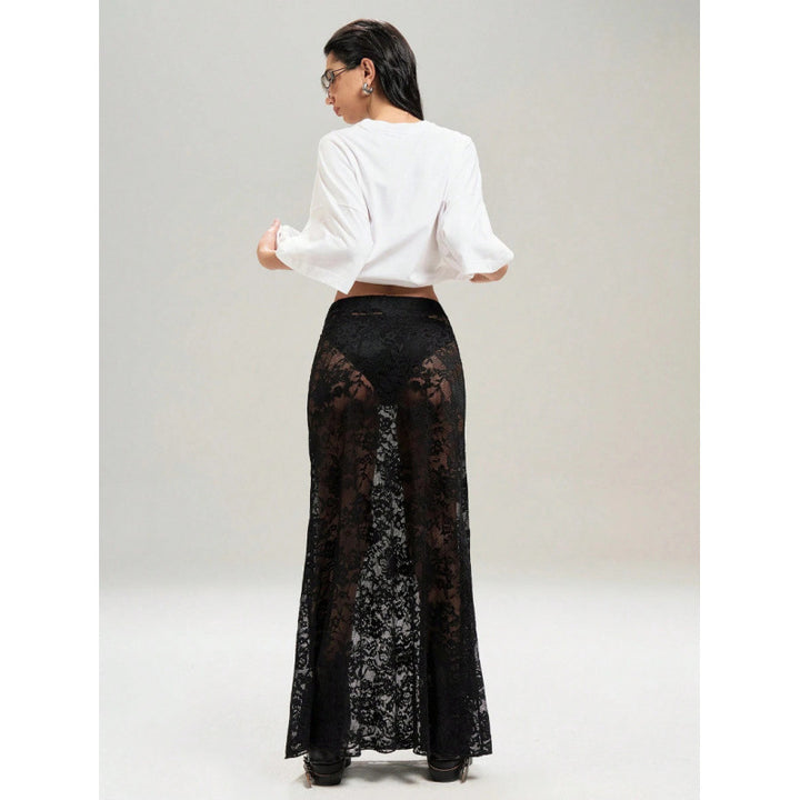 Damer Elegant Spetsmaxi-kjol med genomskinlig design och sidostickning Mirla-Eva Jonsson
