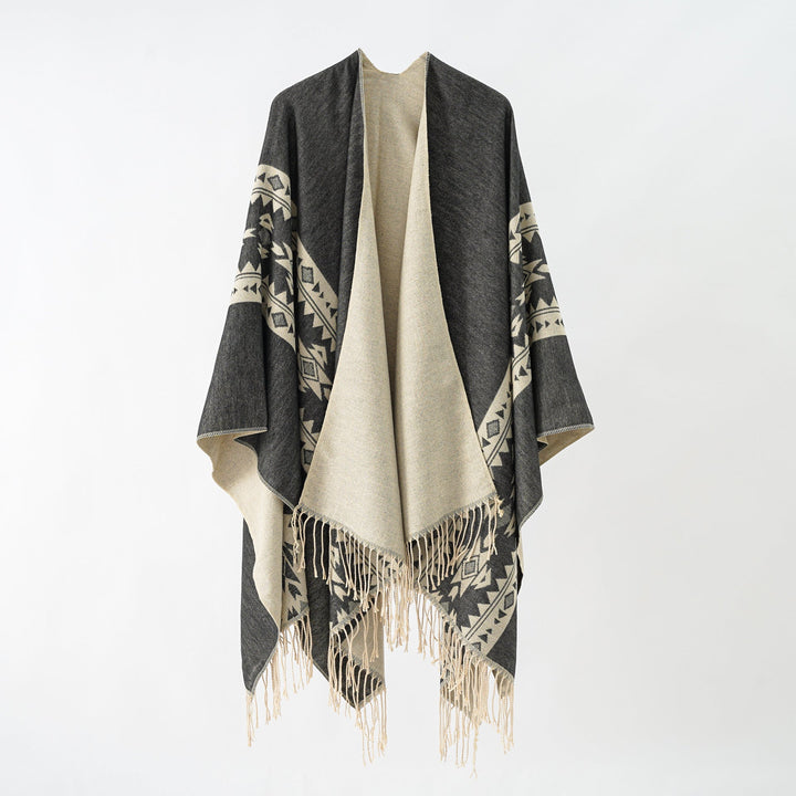 Damer Elegant Stickponcho med Konstfulla Fransar och Blomsterakenter Mirla-Eva Jonsson