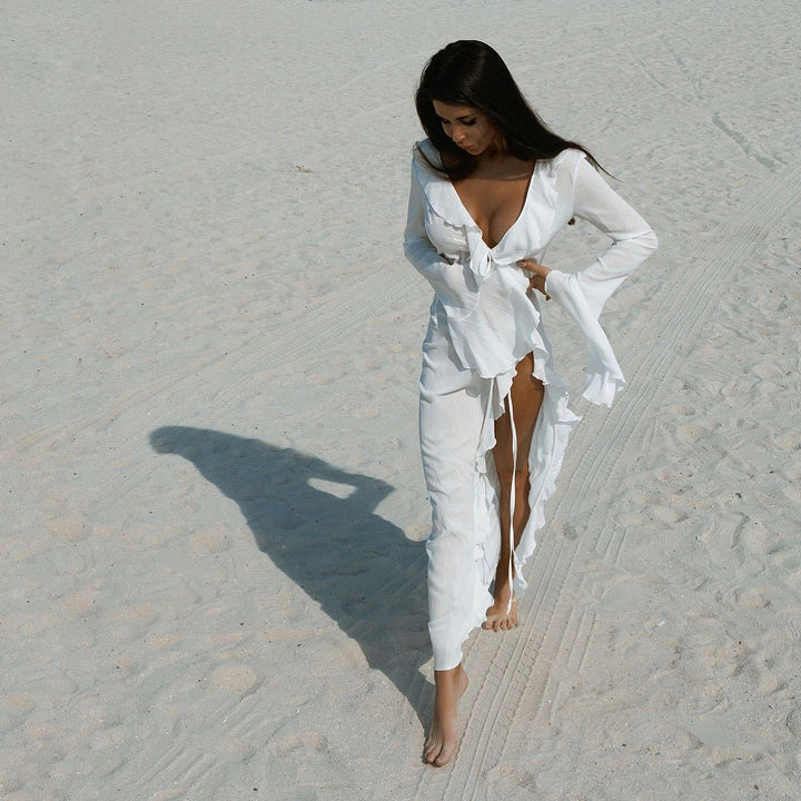 Damer Elegant Strandklänning med Volangdetaljer och Djup V-urringning Mirla-Eva Jonsson