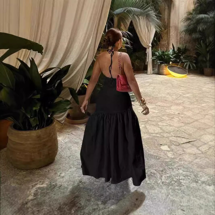 Damer Elegant Strandklänning med sidoflik och djup V-ringning Mirla-Eva Jonsson