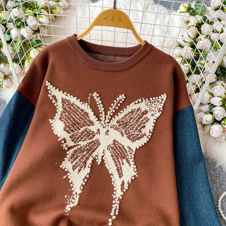 Damer Elegant Tröja med Fjärils Motiv och Denim Ärmar Mirla-Eva Jonsson