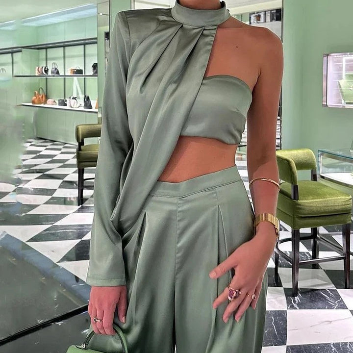 Damer Elegant Tvådelat Set med asymmetrisk Topp och Vida Byxor Mirla-Eva Jonsson