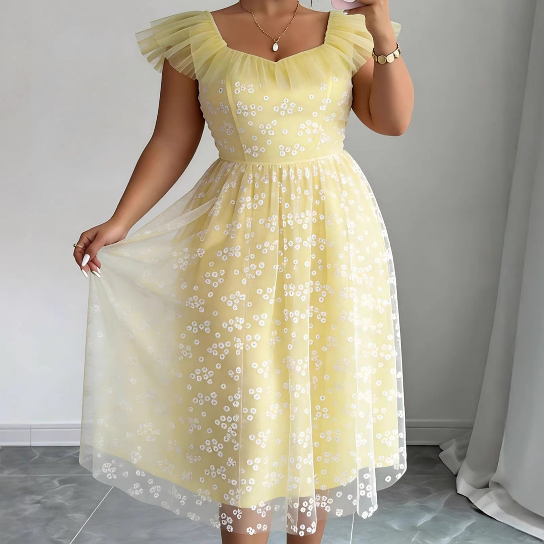 Damer Elegant Tyllklänning med blommönster och puffärmar Mirla-Eva Jonsson