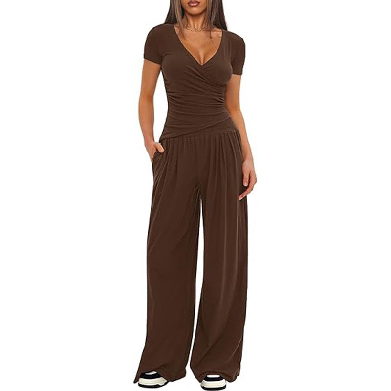 Damer Elegant Wickel- jumpsuit med vida ben och moderna detaljer Mirla-Eva Jonsson