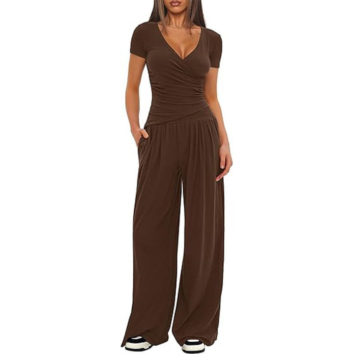 Damer Elegant Wickel- jumpsuit med vida ben och moderna detaljer Mirla-Eva Jonsson