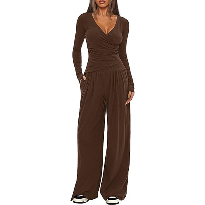 Damer Elegant Wickel- jumpsuit med vida ben och moderna detaljer Mirla-Eva Jonsson