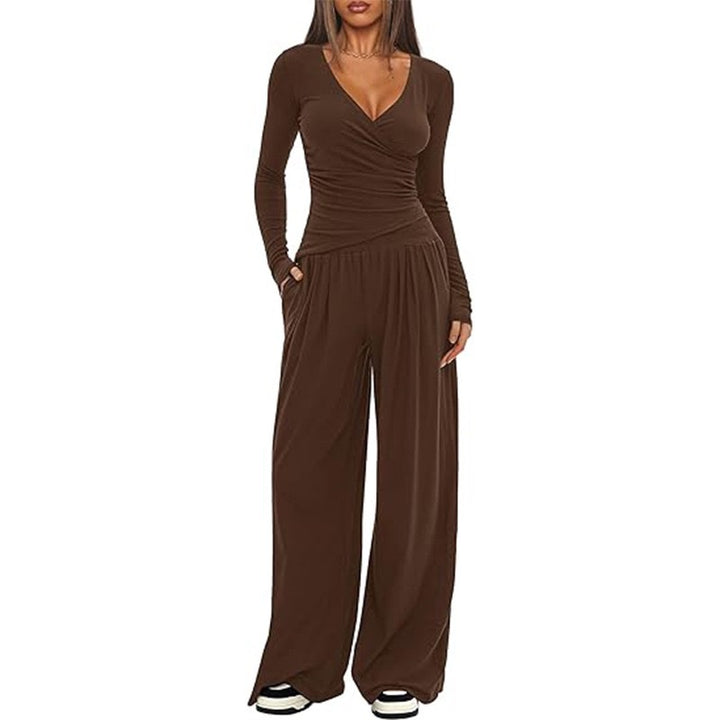 Damer Elegant Wickel- jumpsuit med vida ben och moderna detaljer Mirla-Eva Jonsson