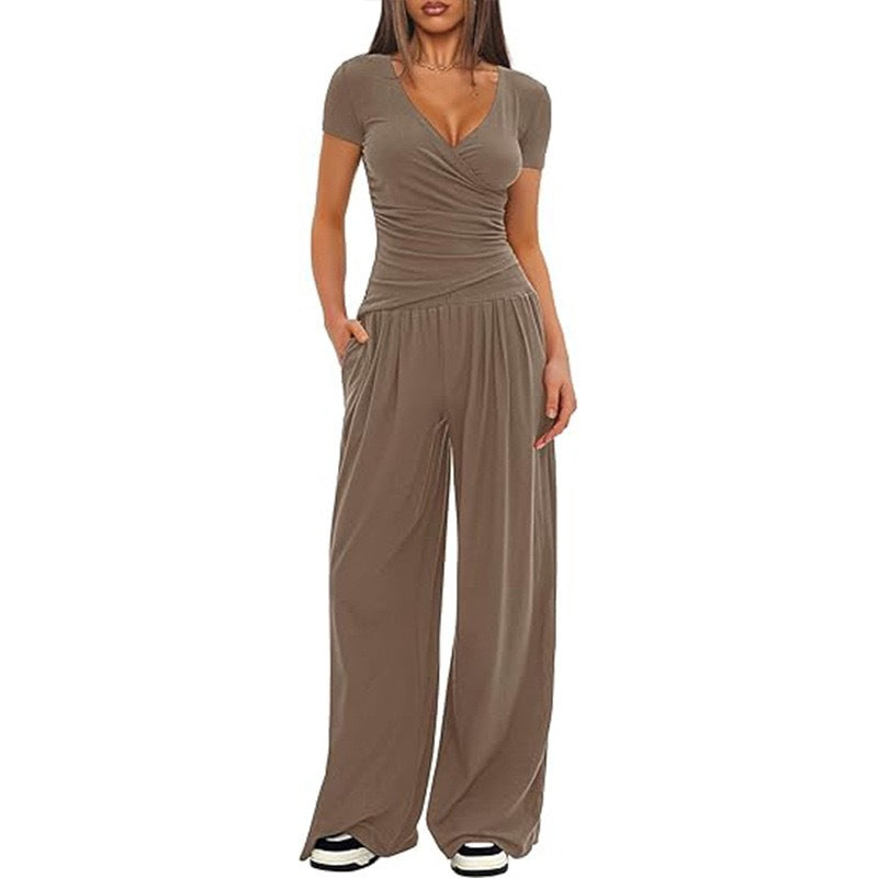 Damer Elegant Wickel- jumpsuit med vida ben och moderna detaljer Mirla-Eva Jonsson