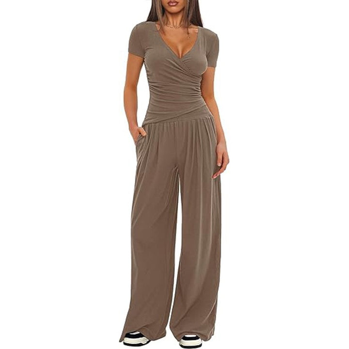 Damer Elegant Wickel- jumpsuit med vida ben och moderna detaljer Mirla-Eva Jonsson