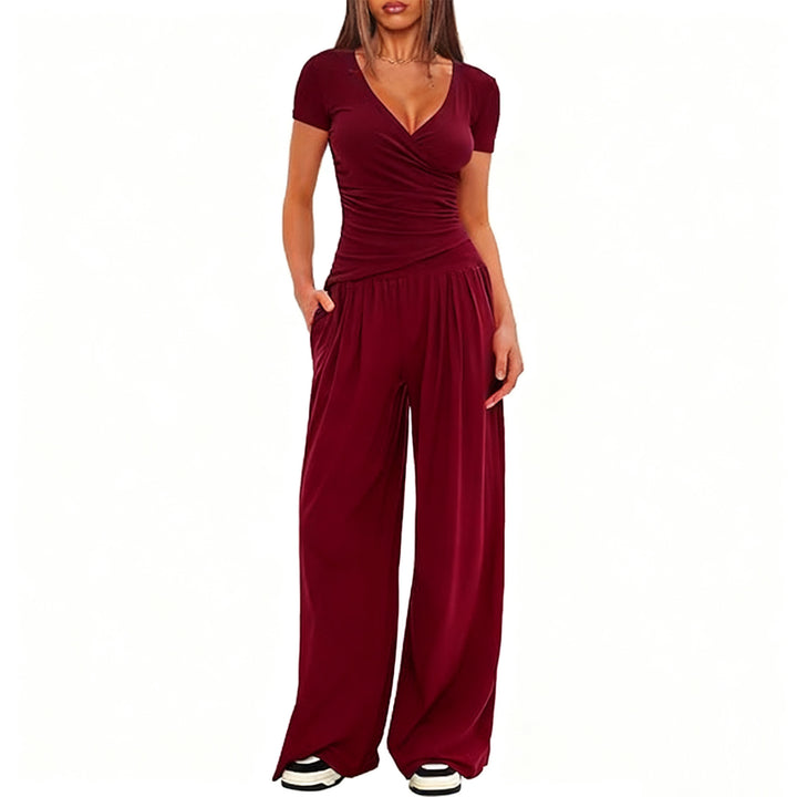 Damer Elegant Wickel- jumpsuit med vida ben och moderna detaljer Mirla-Eva Jonsson