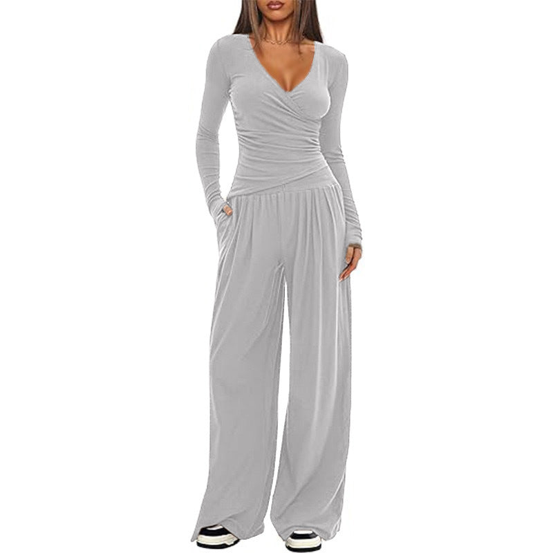 Damer Elegant Wickel- jumpsuit med vida ben och moderna detaljer Mirla-Eva Jonsson