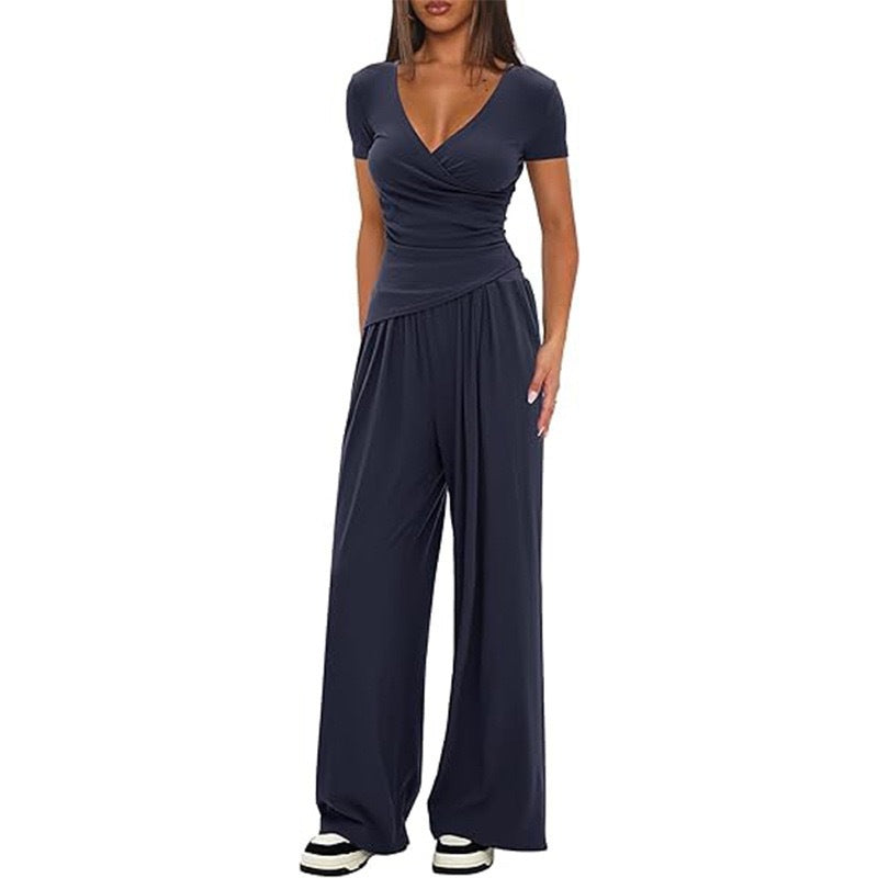 Damer Elegant Wickel- jumpsuit med vida ben och moderna detaljer Mirla-Eva Jonsson