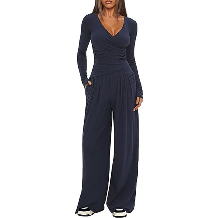 Damer Elegant Wickel- jumpsuit med vida ben och moderna detaljer Mirla-Eva Jonsson