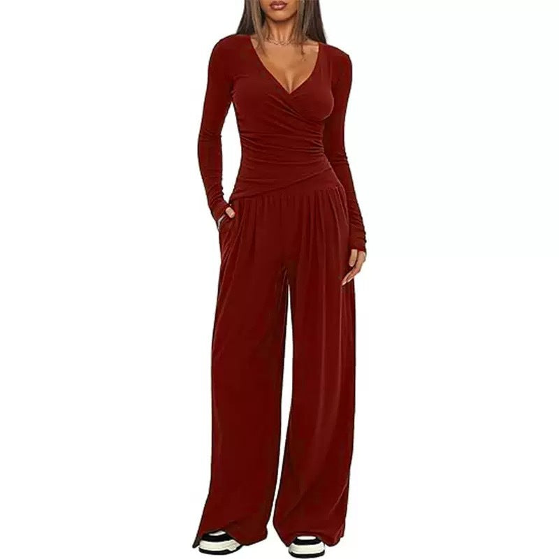 Damer Elegant Wickel- jumpsuit med vida ben och moderna detaljer Mirla-Eva Jonsson