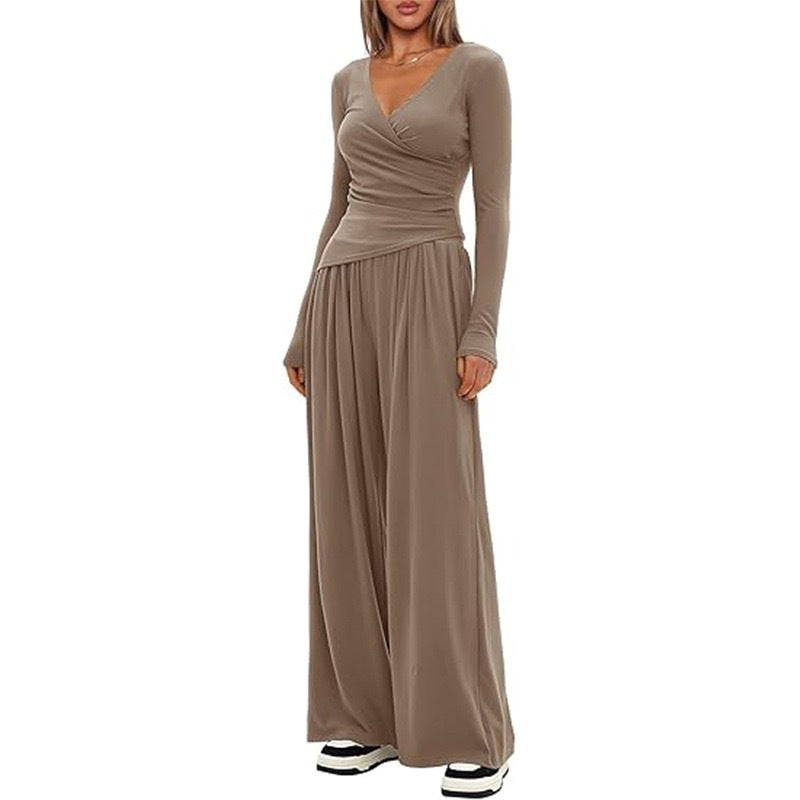 Damer Elegant Wickel- jumpsuit med vida ben och moderna detaljer Mirla-Eva Jonsson