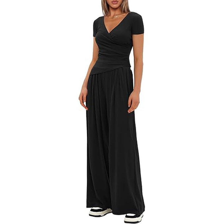 Damer Elegant Wickel- jumpsuit med vida ben och moderna detaljer Mirla-Eva Jonsson