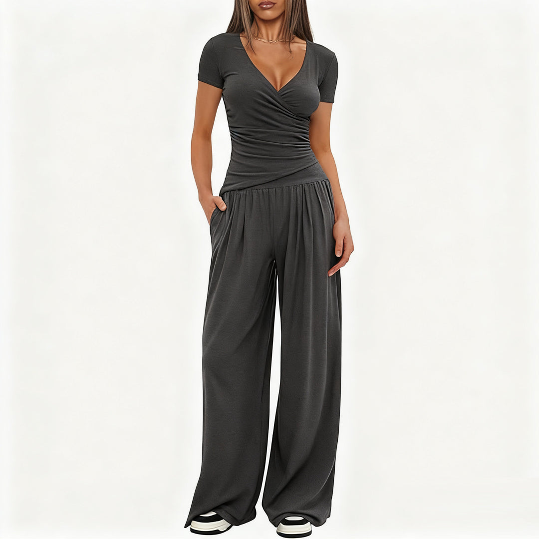 Damer Elegant Wickel- jumpsuit med vida ben och moderna detaljer Mirla-Eva Jonsson