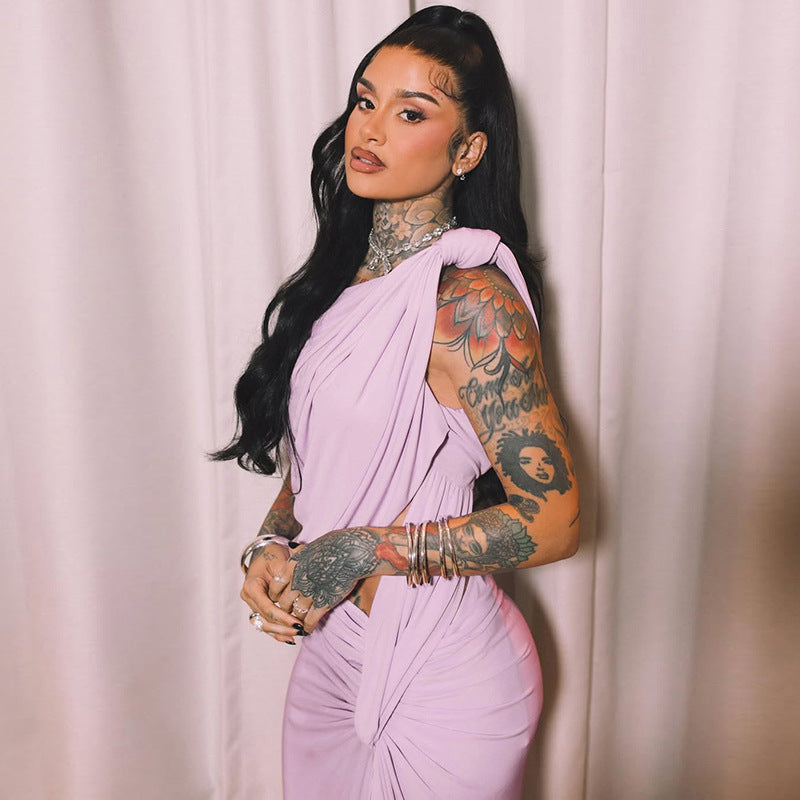 Damer Elegant Wickeldress med asymmetrisk snitt och volangdetaljer Mirla-Eva Jonsson