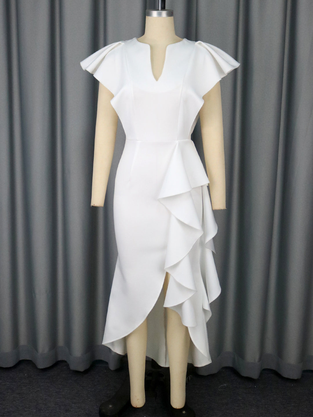 Damer Elegant Wickeldress med voluminösa draperingar Mirla-Eva Jonsson