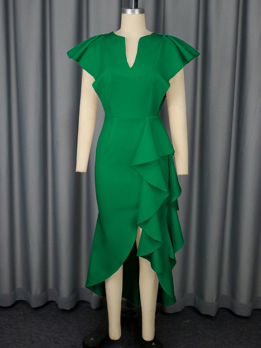 Damer Elegant Wickeldress med voluminösa draperingar Mirla-Eva Jonsson