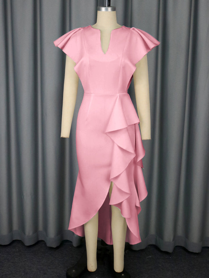 Damer Elegant Wickeldress med voluminösa draperingar Mirla-Eva Jonsson