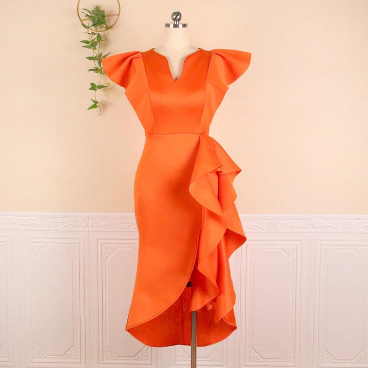 Damer Elegant Wickeldress med voluminösa draperingar Mirla-Eva Jonsson