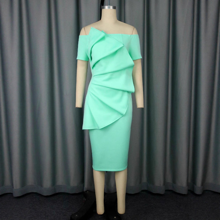 Damer Elegant Wrap Klänning med asymmetrisk design och draperingar Mirla-Eva Jonsson