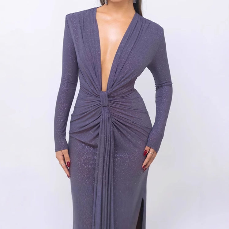 Damer Elegant Wrap Klänning med djup V-ringning och figursydd design Mirla-Eva Jonsson