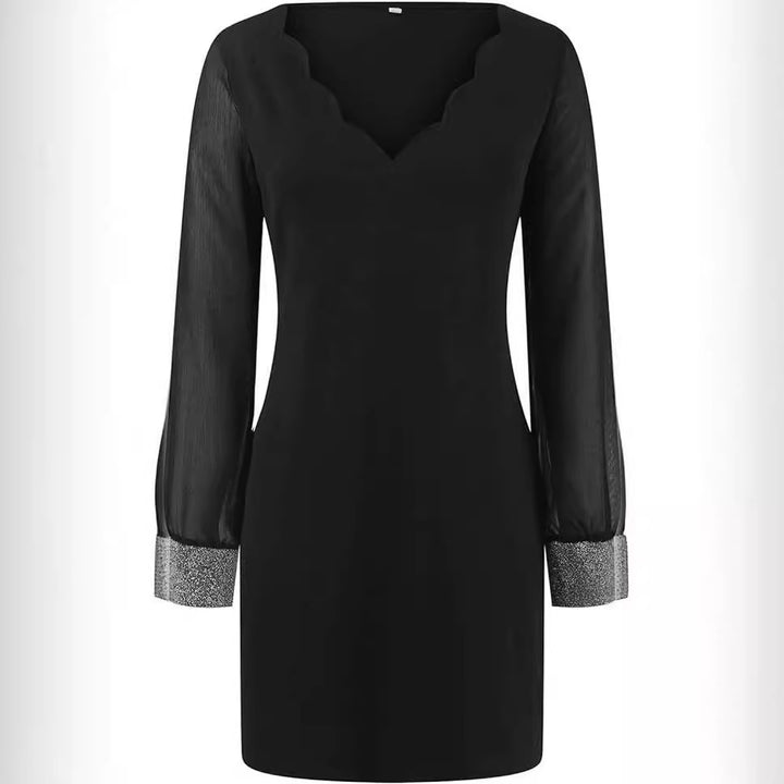 Damer Elegant Wrap-klänning med genomskinliga ärmar och rhinestone-accenter Mirla-Eva Jonsson