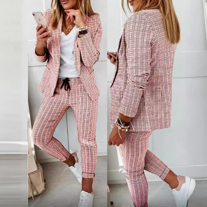 Damer Elegant affärsklänning med modernt rutmönster och praktiska fickor Mirla-Eva Jonsson