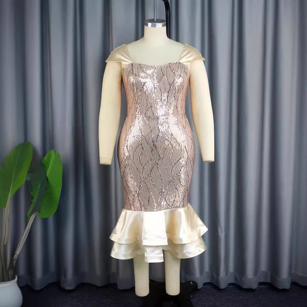 Damer Elegant aftenkjole med glitrende paljetter og feminin flæsekant Mirla-Eva Jonsson