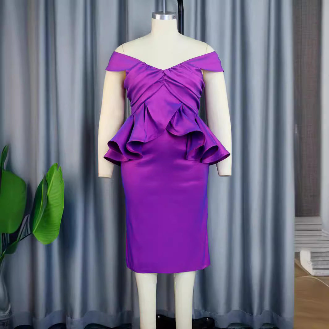 Damer Elegant aftenkjole med off-shoulder design og voluminøse ruffles Mirla-Eva Jonsson