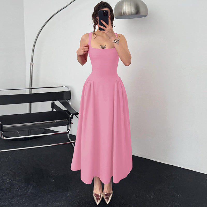 Damer Elegant aftondress med fyrkantig halsringning och flödande kjol Mirla-Eva Jonsson