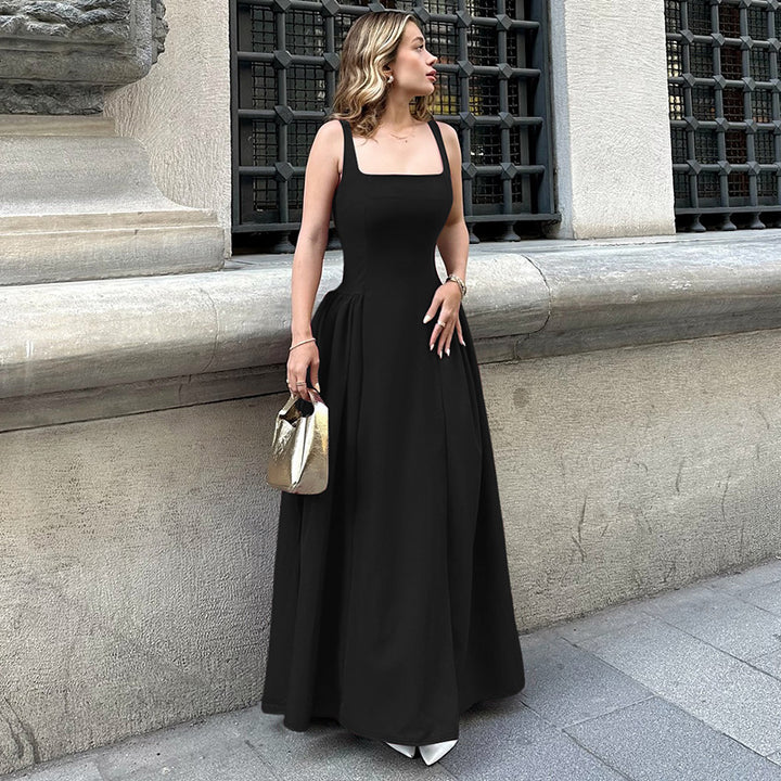 Damer Elegant aftondress med fyrkantig halsringning och flödande kjol Mirla-Eva Jonsson