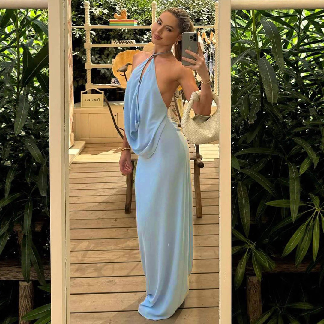 Damer Elegant aftonklänning med djup V-ringning och flytande tyg Mirla-Eva Jonsson