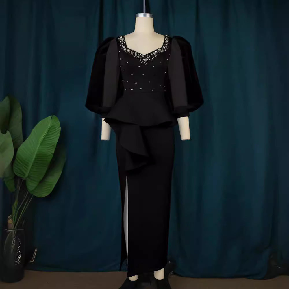Damer Elegant aftonklänning med glittrande pärlor och voluminösa tylleärmhem Mirla-Eva Jonsson