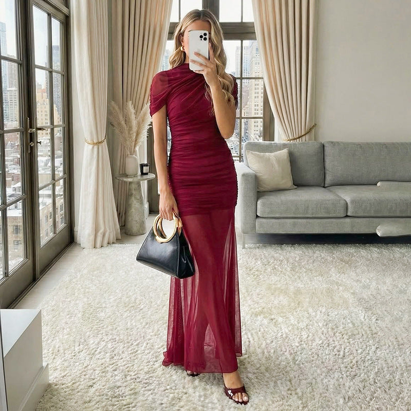 Damer Elegant aftonklänning med raffinerade draperingar och figurnära snitt Mirla-Eva Jonsson