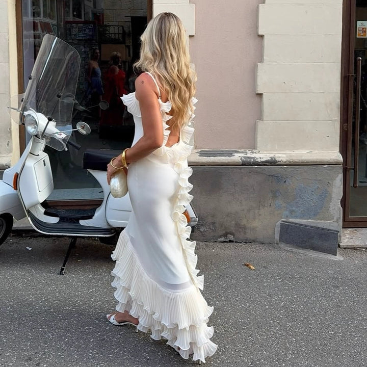Damer Elegant aftonklänning med volangdetaljer och flytande snitt Mirla-Eva Jonsson
