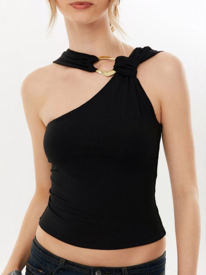 Damer Elegant asymmetrisk Blus med guldspänne Mirla-Eva Jonsson