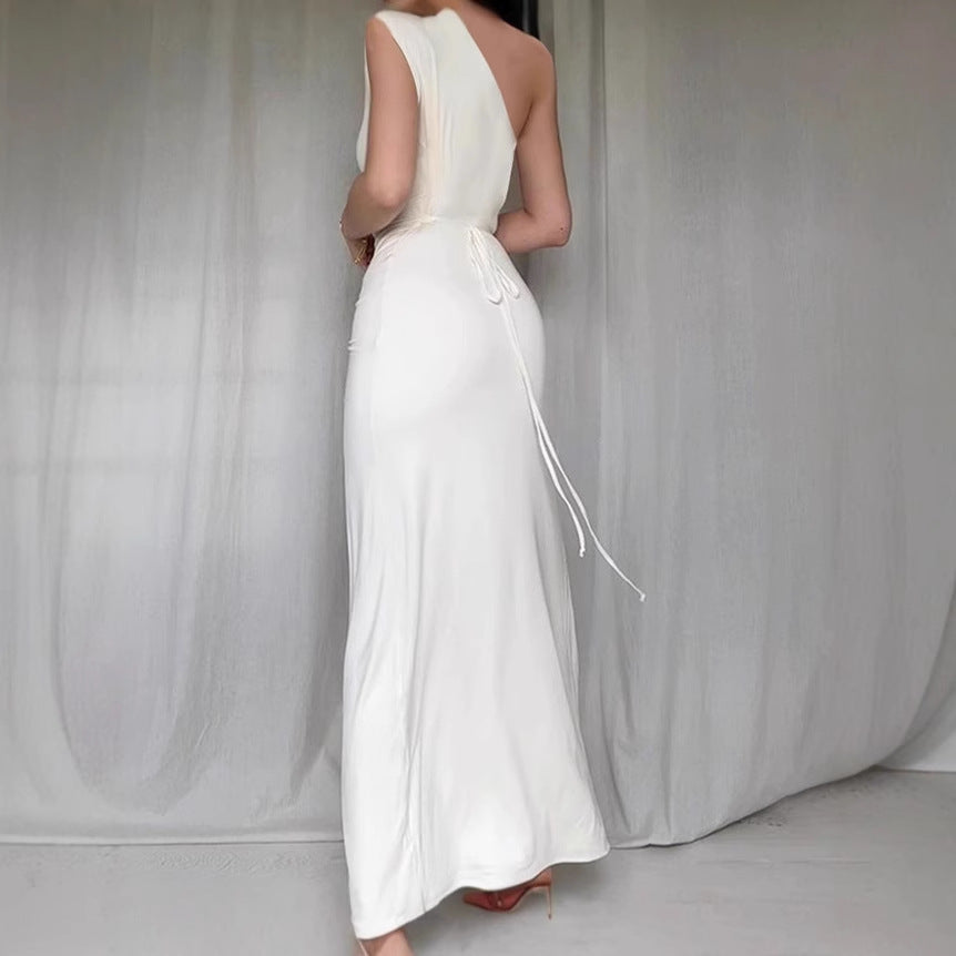 Damer Elegant asymmetrisk Maxiklänning med raffinerad drapering Mirla-Eva Jonsson