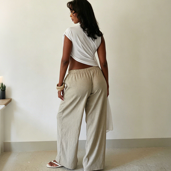 Damer Elegant asymmetrisk topp med draperingar Mirla-Eva Jonsson